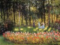 La familia del artista en el jardín Claude Monet Impresionismo Flores